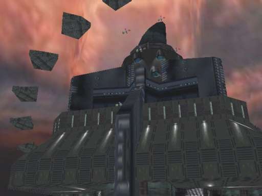 Una grande costruzione poligonale di Turrican 3D sotto un cielo rosso.
